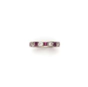 □ RUBY, DIAMOND AND WHITE ZIRCON ETERNITY RING, 1950s