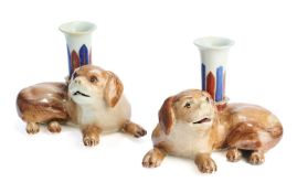 A PAIR OF CHINESE PUG DOG CANDLE HOLDERS, QING DYNASTY