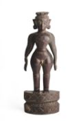 □ A CARVED WOOD VOTIVE FIGURE, TAMIL NADU, SOUTH INDIA, EARLY 20TH CENTURY