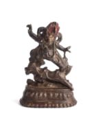 A SMALL BRONZE FIGURE OF YAMA, TIBET, 15TH/16TH CENTURY