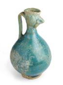 A KASHAN PEACOCK HEAD EWER, PERSIA, 13TH CENTURY