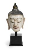 A CARVED AND PAINTED MARBLE HEAD OF BUDDHA, BURMA (NOW MYANMAR), CIRCA 1900