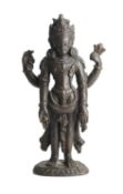 □ A NEPALESE BRONZE FIGURE OF SIVA