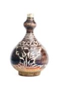 A SMALL LUSTRE PAINTED POTTERY BOTTLE, SAFAVID, 17TH CENTURY