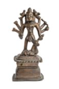 □ A FOLK BRONZE FIGURE OF DURGA SLAYING THE BUFFALO DEMON, WESTERN DECCAN, INDIA, 18TH / 19TH CENTUR