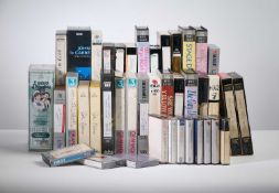 A LARGE GROUP OF VHS VIDEO TAPES & AUDIO CASSETTES