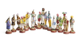 A COLLECTION OF EIGHTEEN SMALL PAINTED CLAY FIGURES, LUCKNOW, INDIA, EARLY 20TH CENTURY