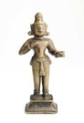 A BRONZE FIGURE OF A MALE DEITY, ORISSA (ODISHA), EASTERN INDIA, 18TH/19TH CENTURY