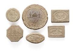 SIX SMALL ISLAMIC CLAY PLAQUES, PROBABLY QAJAR, PERSIA, 19TH CENTURY
