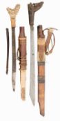 TWO DYAK SWORDS (MANDAU), BORNEO, LATE 19TH/20TH CENTURY
