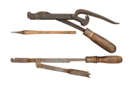 TWO GOAT'S FOOT LEVERS FOR CROSSBOWS, 19TH CENTURY
