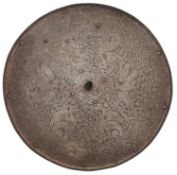 AN ETCHED CIRCULAR SHIELD, 20TH CENTURY
