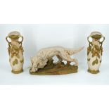 A Bohemian Royal Dux glazed ceramic hunting dog and his catch, together with a pair of vases