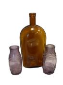 THREE ANTIQUE BOTTLES INCLUDING TWO SUN PURPLED MUSTARD BOTTLES AND AN AMBER WHISKEY BOTTLE