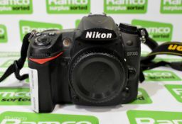 Nikon D7000 digital SLR camera with Nikon EN-EL15 7.0V 1900mAh battery with user's manual