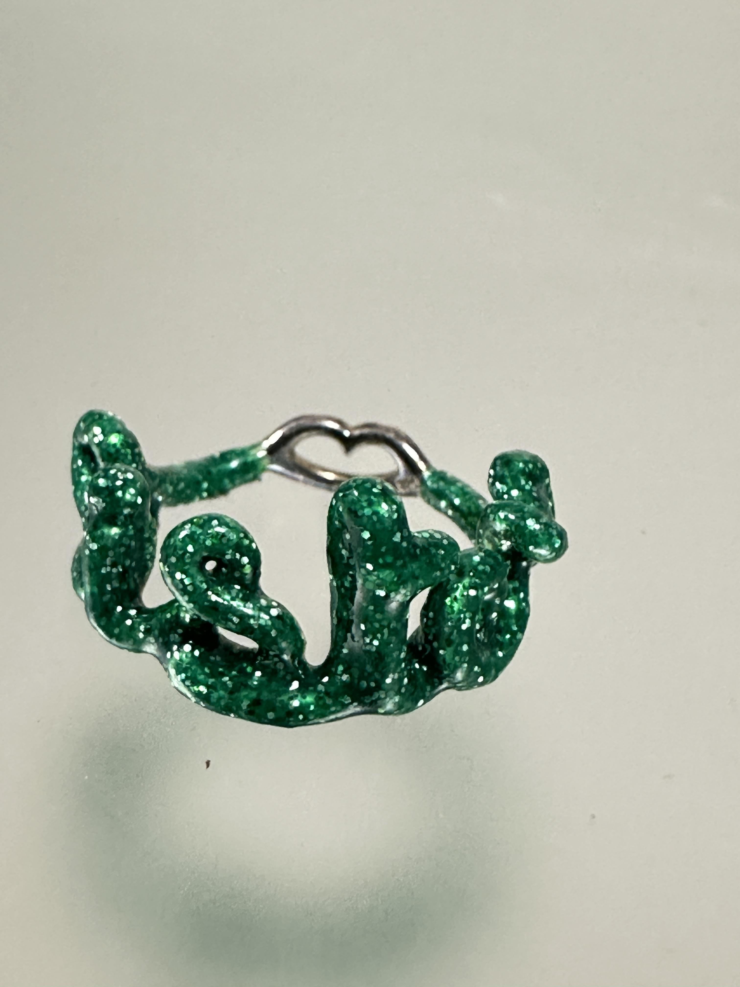 A Solange Azagury- Partridge silver green enamel Sister ring shows no signs of chips or damage K/L