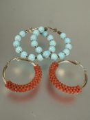 A pair of gold hoop earrings with pink coral beads D x 3cm and a pair of 9ct gold hoop earring set