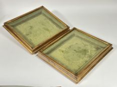 Property of the late Countess Haig, a pair of gilt framed sage green velvet lined table showcases