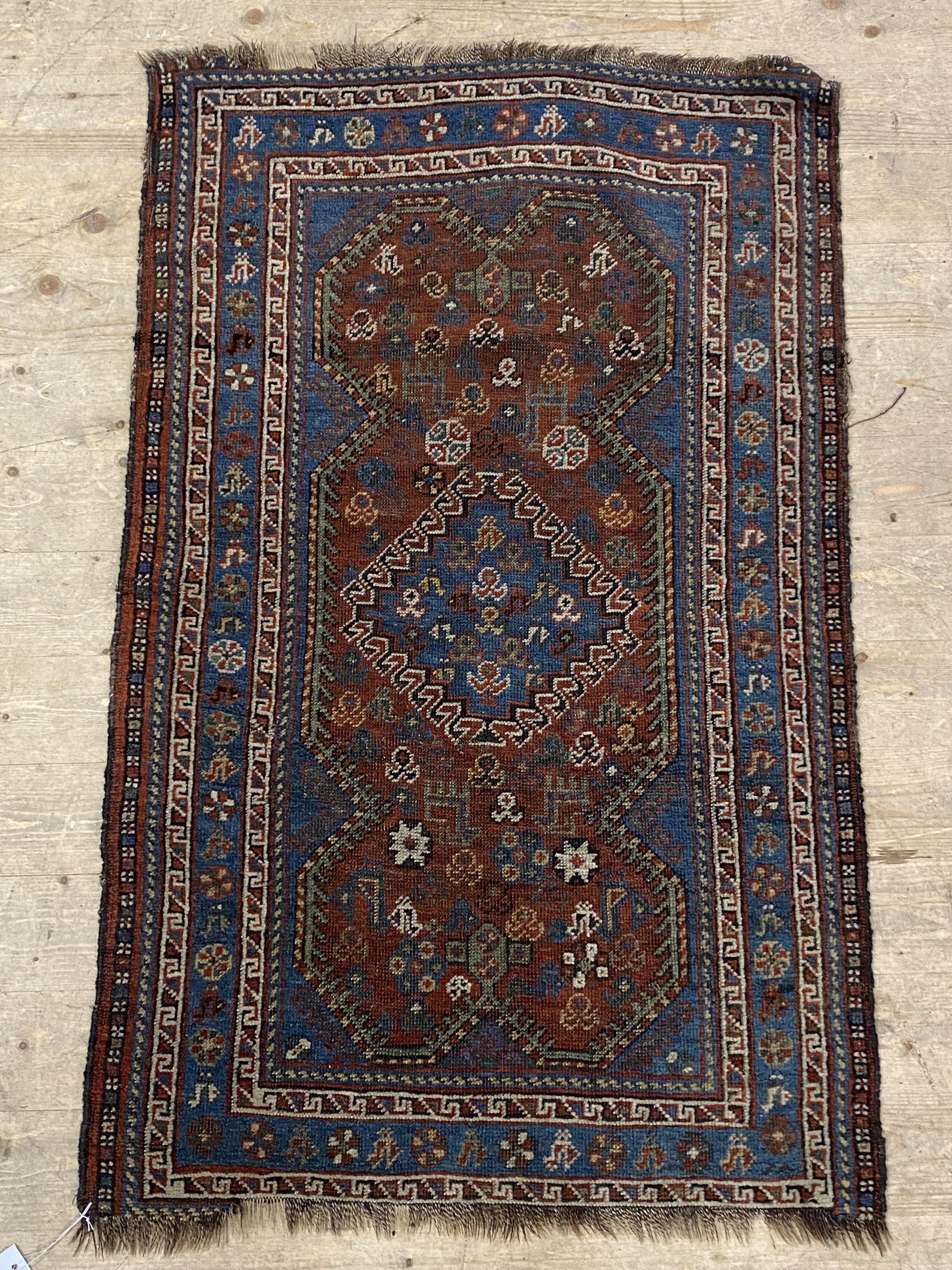 A South east Persian / Baluchi antique hand knotted rug, of all over stylised floral and geometric