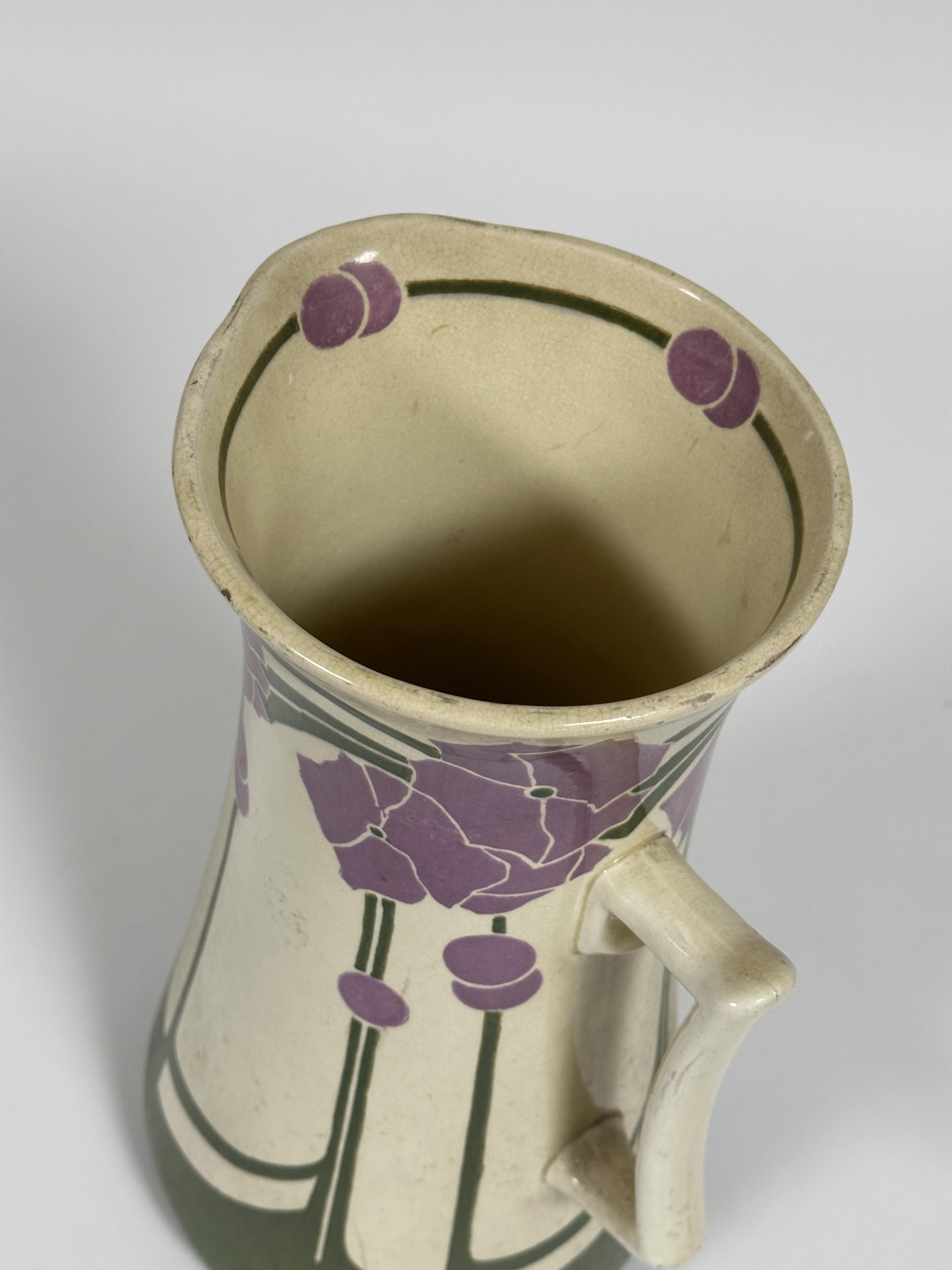 A Edwardian Mintons pottery ewer of flared design with floral and leaf in the Art Nouveau taste no - Image 2 of 3