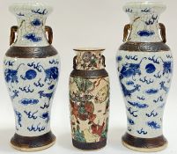 A pair of Chinese blue and white porcelain Nanjing ware crackle glaze baluster form vases