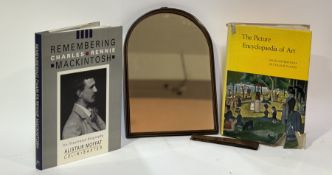 An arched wooden wall hanging/table top mirror together with 