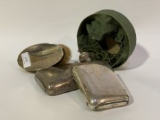 A hallmarked silver mounted dressing table brush in case, together with a silver plated hip