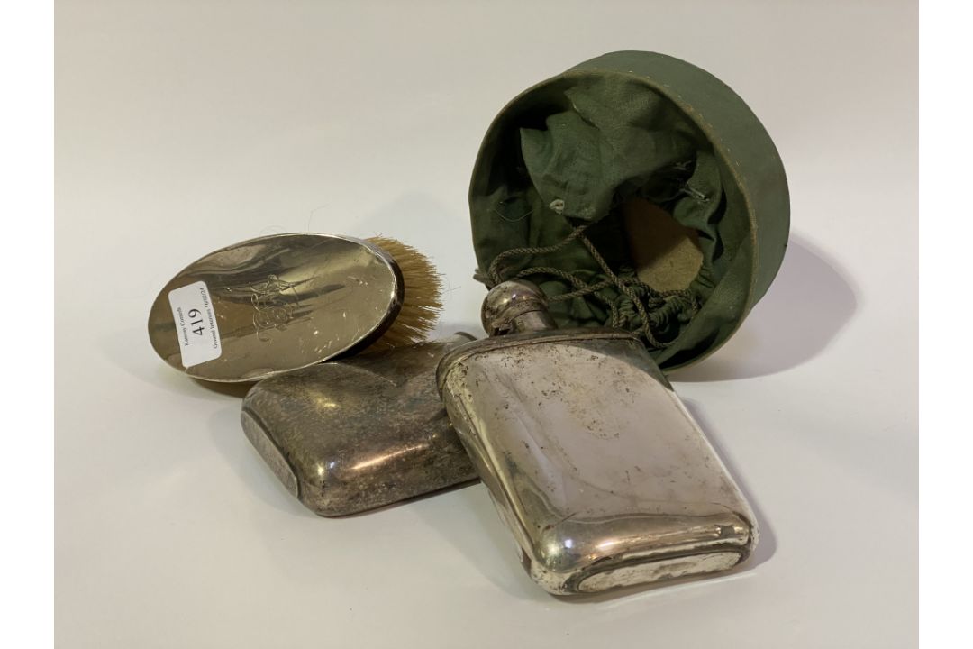 A hallmarked silver mounted dressing table brush in case, together with a silver plated hip