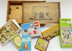 A quantity of vintage toys comprising a boxed wooden four horse stable to build, a boxed Subuteo