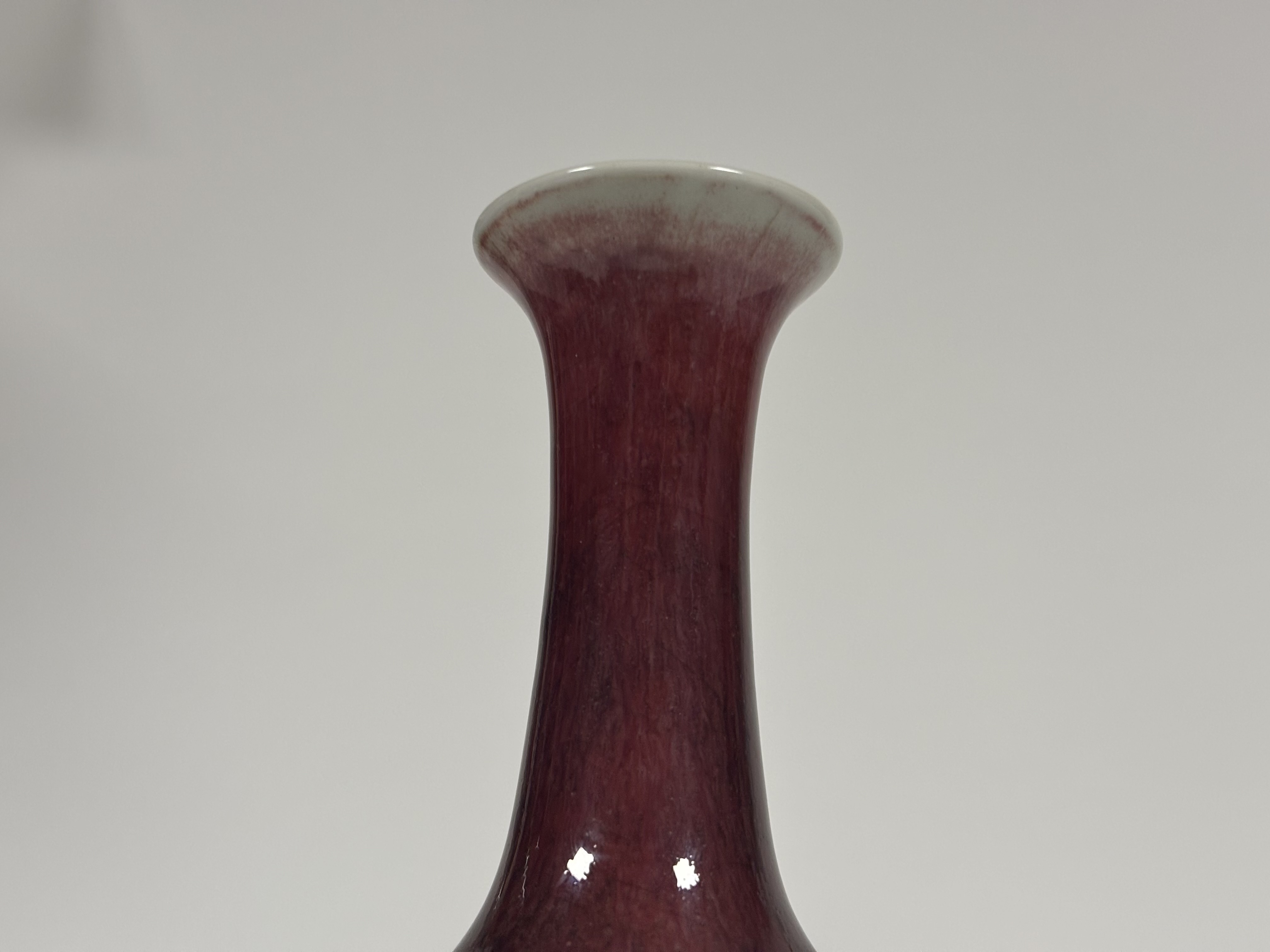 An unusual Chinese celadon porcelain vase with flambe glaze, 18th century, the slender neck and - Image 3 of 7