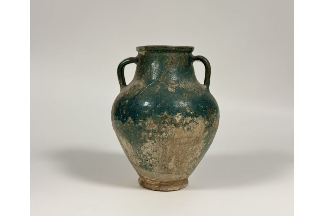 An Islamic, Kashan, glazed pottery twin-handled jar, probably 12th/13th century, with iridescent - Image 2 of 5
