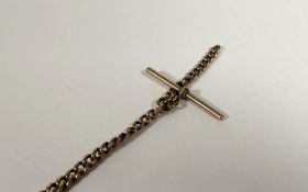 A 9ct gold curblink Albert watch chain, with T-bar, the chain stamped 