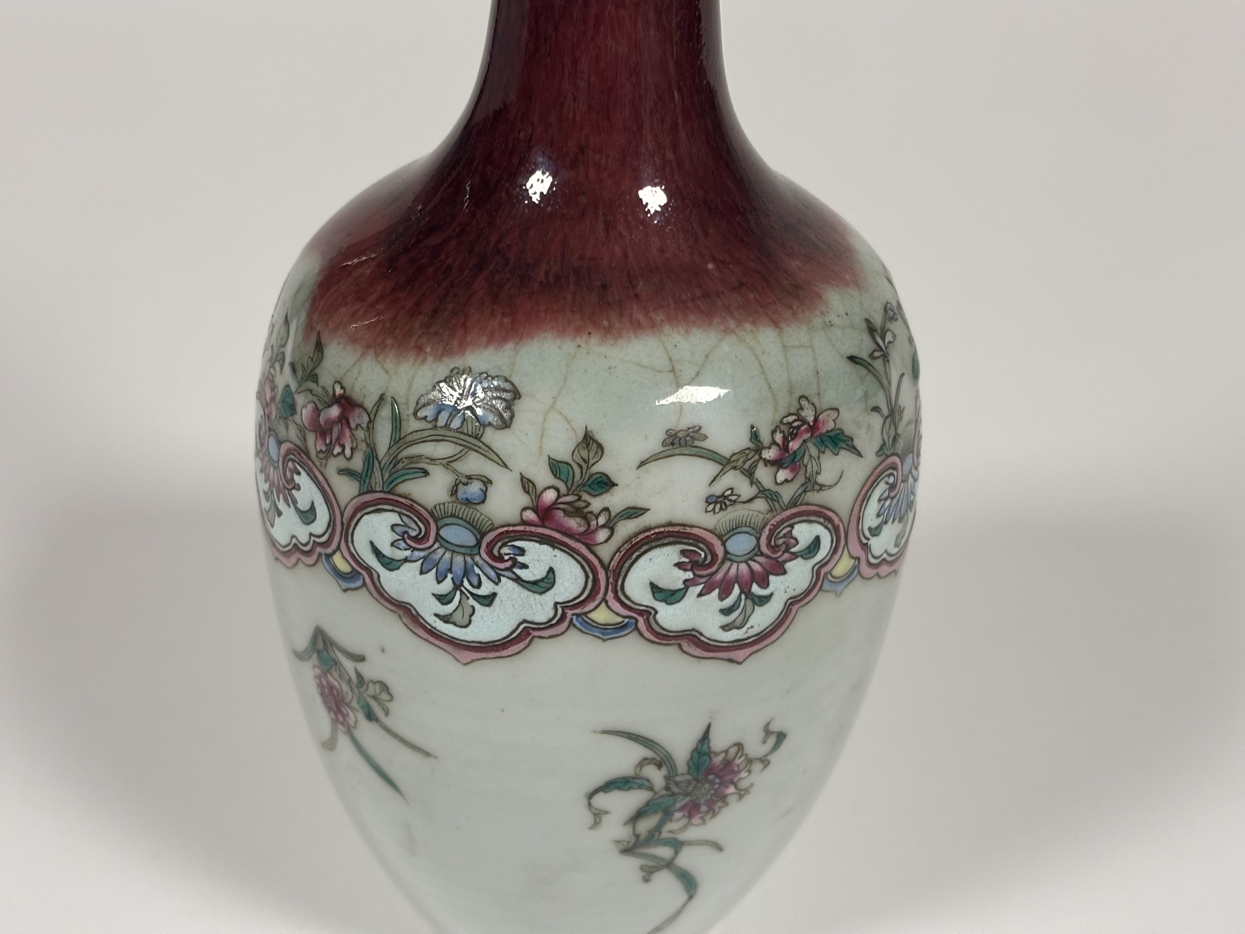 An unusual Chinese celadon porcelain vase with flambe glaze, 18th century, the slender neck and - Image 2 of 7