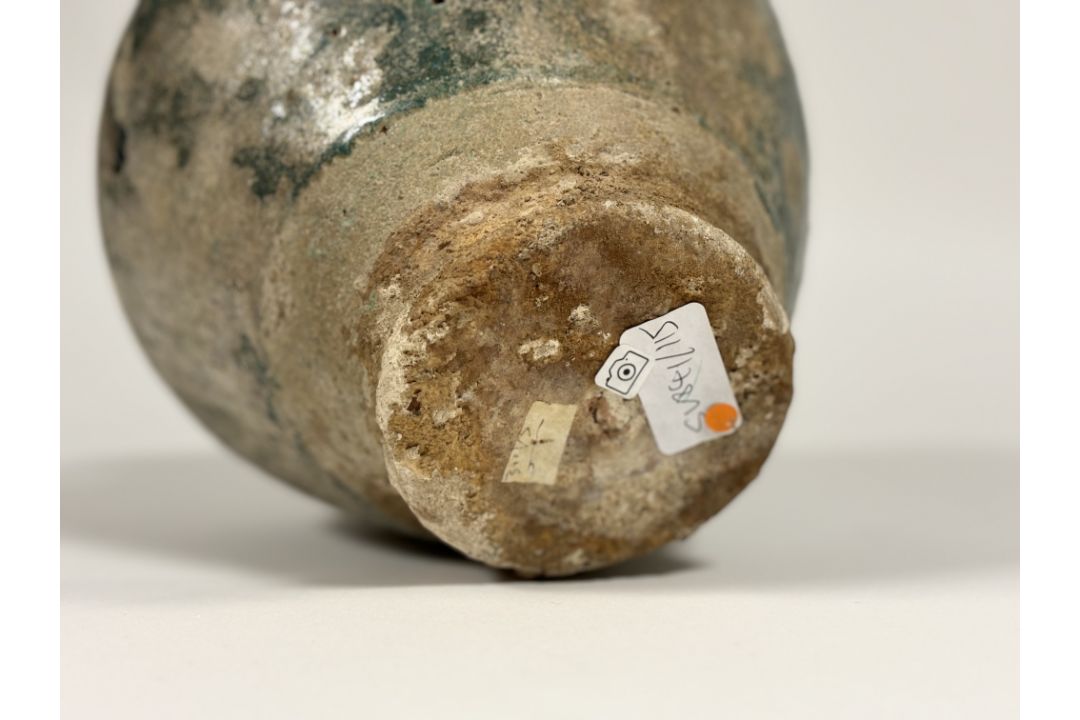 An Islamic, Kashan, glazed pottery twin-handled jar, probably 12th/13th century, with iridescent - Image 5 of 5