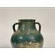 An Islamic, Kashan, glazed pottery twin-handled jar, probably 12th/13th century, with iridescent - Image 1 of 5