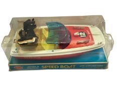 Redbox battery operated Gulf Star model speed boat, with Johnson outbroad motor, on plinth with bubb