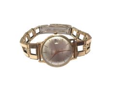 1960s Trebex 9ct gold cased calendar wristwatch on a gold plated bracelet