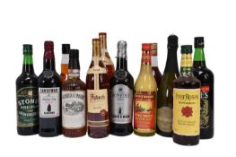 Twelve bottles, to include Sandeman Donfino Jerez, Campari, Four Roses Bourbon