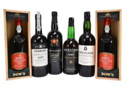 Six bottles, to include Cockburn's Port Fine Old Tawny, Cockburn's Quinta Do Tua 1987 Vintage Port,