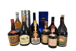 Twelve bottles, to include Drambuie, Tia Maria, Ricard Pastis De Marseille