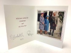 H.M. Queen Elizabeth II and H.R.H. The Duke of Edinburgh, signed 1999 Christmas card with twin gilt