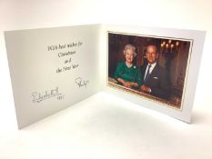 H.M. Queen Elizabeth II and H.R.H. The Duke of Edinburgh, signed 1997 Christmas card with twin gilt