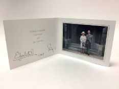 H.M. Queen Elizabeth II and H.R.H. The Duke of Edinburgh, signed 2005 Christmas card with twin gilt