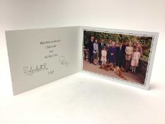 H.M. Queen Elizabeth II and H.R.H. The Duke of Edinburgh, signed 1998 Christmas card with twin gilt
