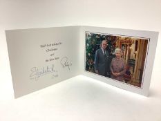 H.M. Queen Elizabeth II and H.R.H. The Duke of Edinburgh, signed 2010 Christmas card with twin gilt
