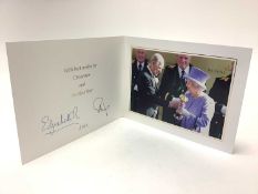 H.M. Queen Elizabeth II and H.R.H. The Duke of Edinburgh, signed 2012 Christmas card with twin gilt