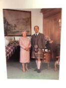 H.M. Queen Elizabeth II and H.R.H. The Duke of Edinburgh, signed 1995 Christmas card with gilt embos