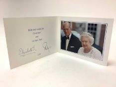 H.M. Queen Elizabeth II and H.R.H. The Duke of Edinburgh, signed 2011 Christmas card with twin gilt