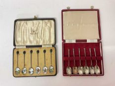 Cased set of six silver enamel coffee spoons, and another cased silver set