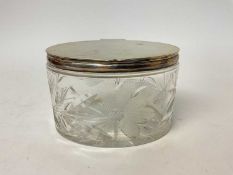 Good quality cut glass biscuit box of oval form with silver plated mounts, 16cm x 12cm x 10cm high